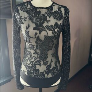 NWT beautiful black body suit with sheer dot sleeves. Boutique! Size small